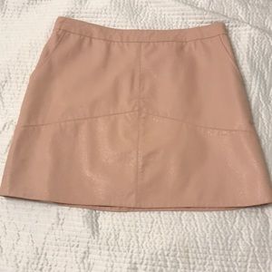 Pink faux leather mini skirt
